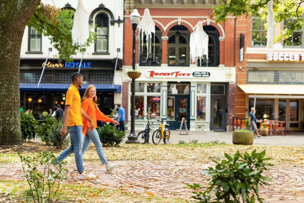 Two students walk through Market Square in downtown Knoxville