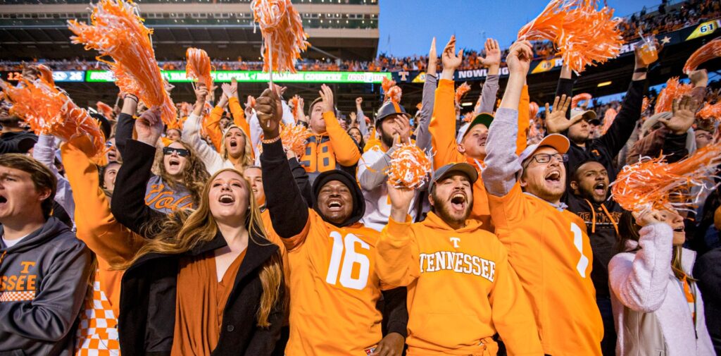 The student section of a UT home football game, a sea of orange