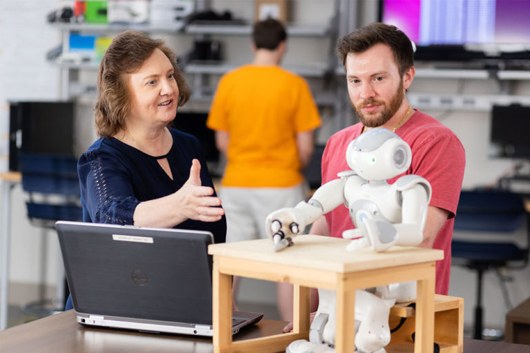 Student working with a faculty member