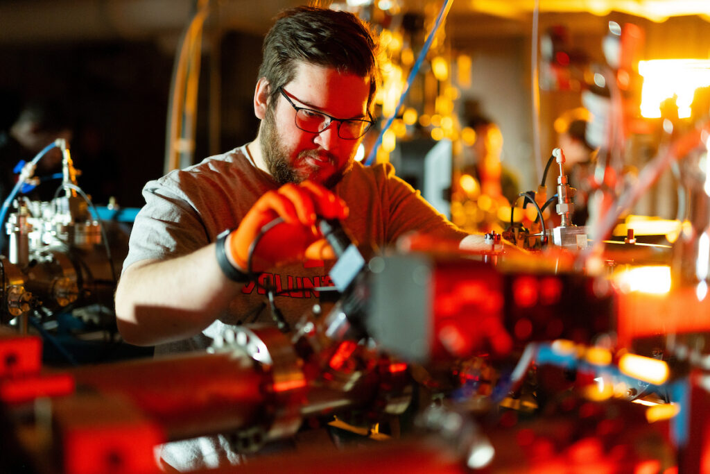 George Adumson, 1st year phd student, Nuclear Engineering, prepares to test materials samples using a 3MV tandem accelerator with multiple beamlines and stations in the Ion Beam Materials Laboratory (IBML) inside Senter Hall on January 11, 2024. Photo by Steven Bridges/University of Tennessee. UTK UTK