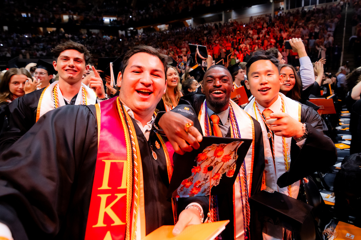Graduates celebrate after the College Arts and Sciences commencement ceremony inside Thompson-Boling Arena at Food City Center on May 18, 2024. Photo by Steven Bridges/University of Tennessee.