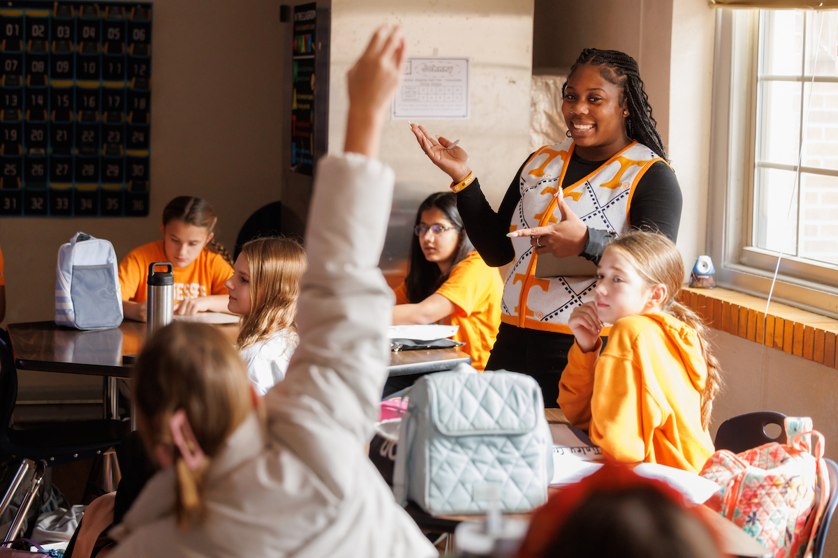 Tayla Thomas, a student from Memphis, TN, teaches a 6th grade math class at a local elementary school